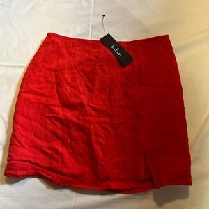 Lulu’s Coral skirt with a small side slit